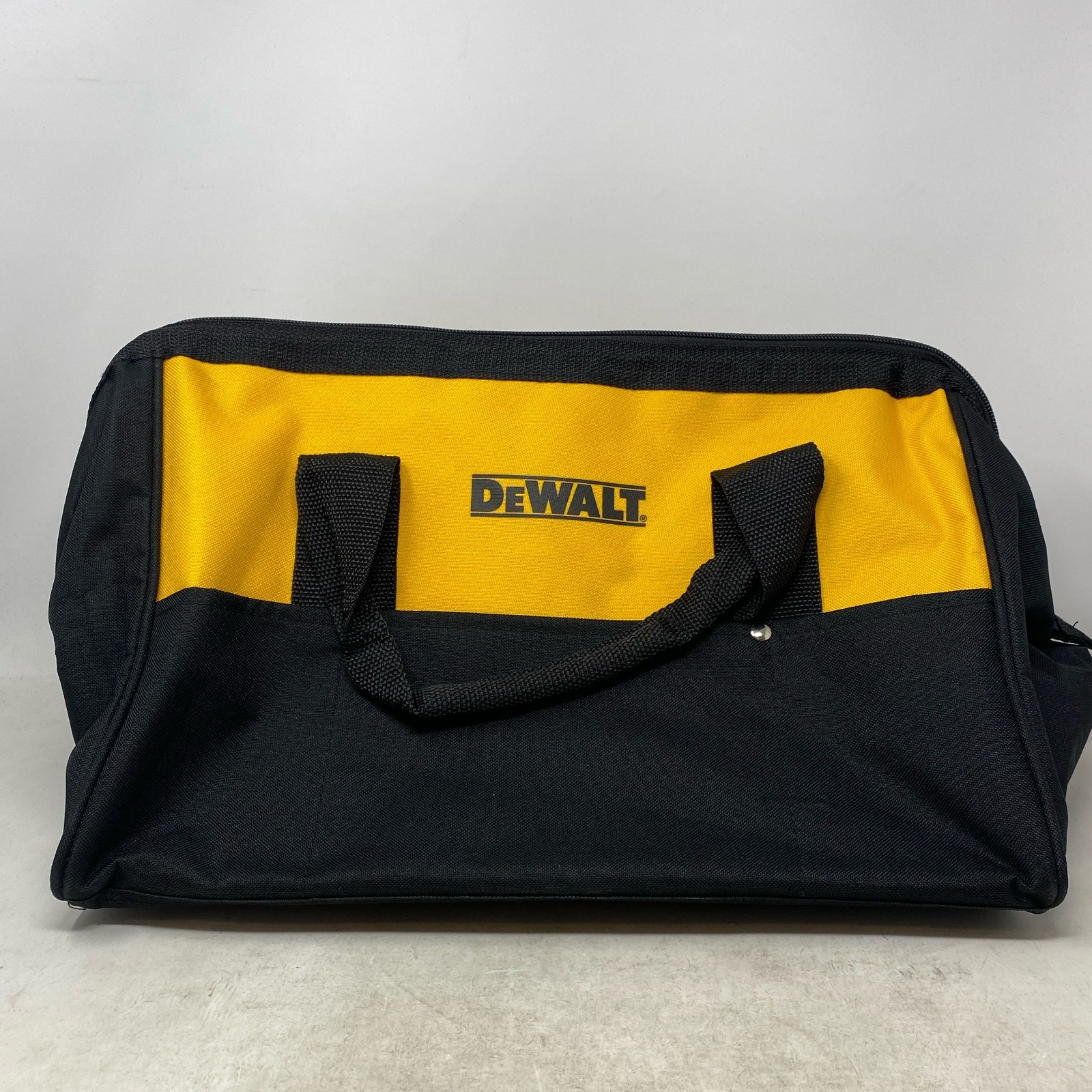 DEWALT 15″ Medium Heavy-Duty Contractor Tool Bag, Black/Yellow (629053-00)